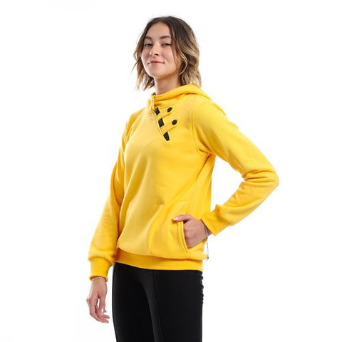 Women's sweatshirt with a pocket, zipper and buttons on the neck